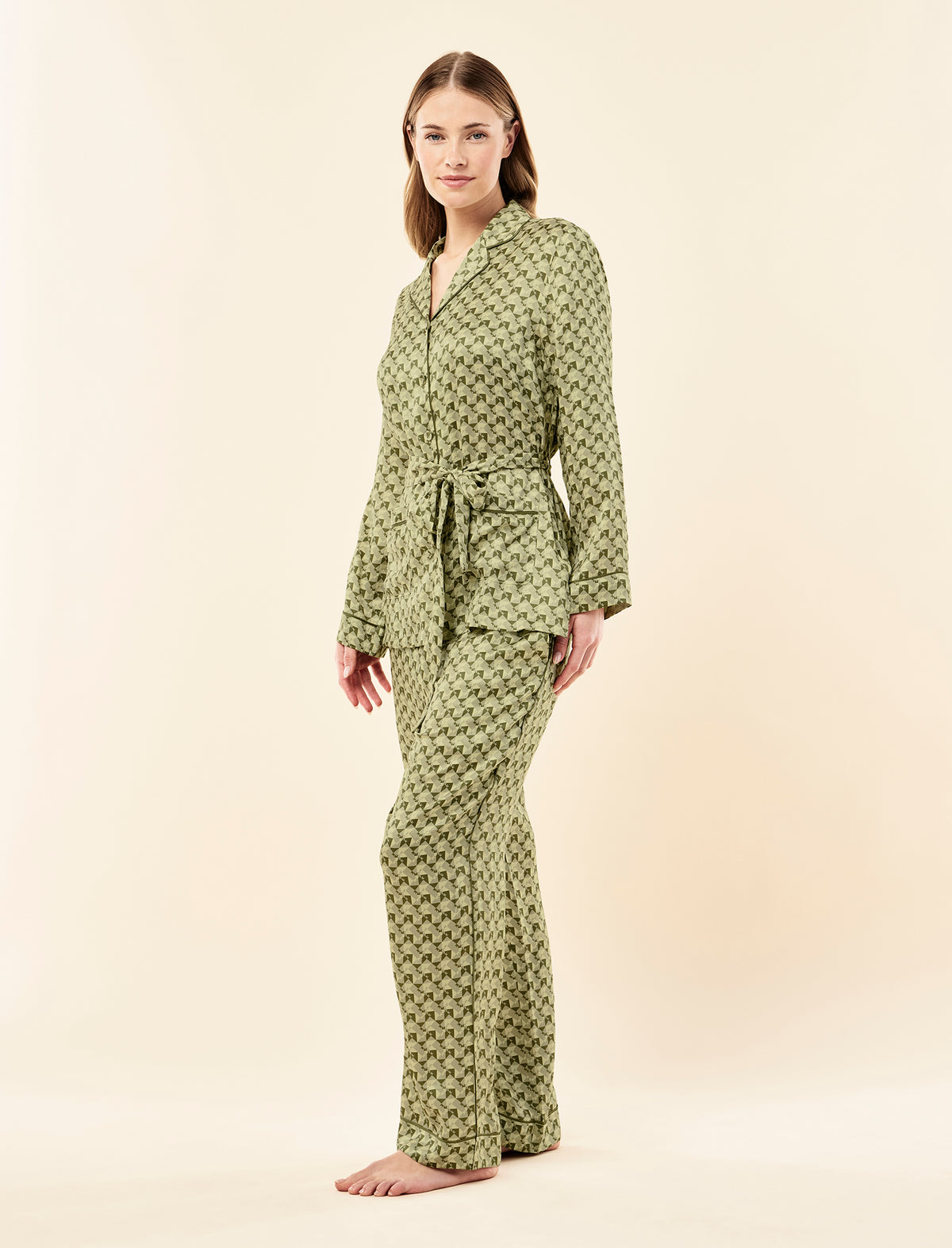 Sianie wearing the Karen Walker Monogram Tiles Silk Wrap PJ Set
[model: Sianie wears size S |  Height: 175m
/ 5’9” | Bust: 85cm | Waist: 66cm| Hips: 93cm]