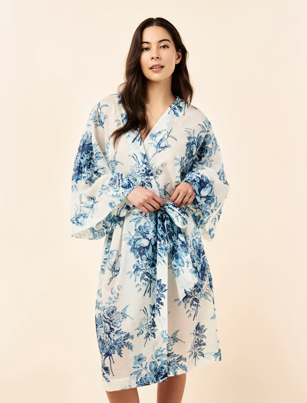 Sakura wearing the Karen Walker Romantic Floral Midi Wide Sleeve Robe
[model: Sakura wears size S |  Height: 173cm/ 5’8” | Bust: 81cm | Waist: 64cm | Hips: 89cm]