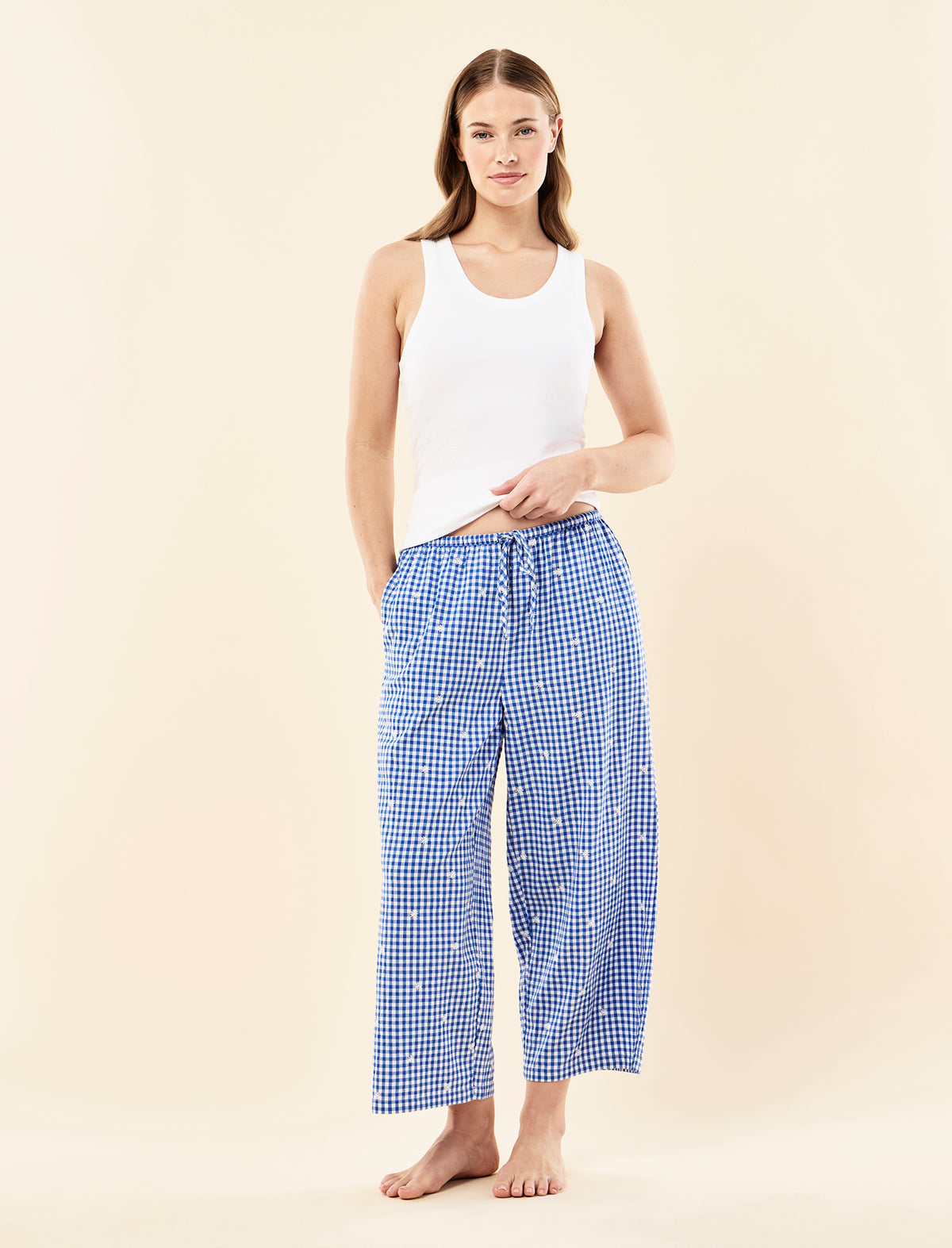 Sianie wearing the Daisy Gingham Crop Pant
[model: Sienie wears size S |  Height: 175m
/ 5’9” | Bust: 85cm | Waist: 66cm| Hips: 93cm]